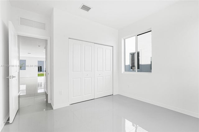 22519 SW 125th Ave Unit B, Miami, FL 33170 - unfurnished bedroom featuring a closet and baseboards