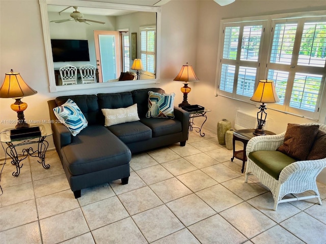 301 E Mcnab Rd Unit 205, Pompano Beach, FL 33060 - tiled living area featuring ceiling fan and healthy amount of natural light