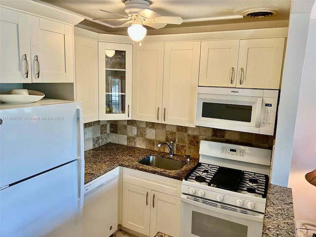 301 E Mcnab Rd Unit 205, Pompano Beach, FL 33060 - kitchen with white appliances, a sink, white cabinetry, and glass insert cabinets