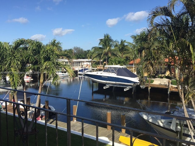301 E Mcnab Rd Unit 205, Pompano Beach, FL 33060 - dock with a water view and boat lift