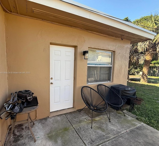1025 NW 3rd Ave, Fort Lauderdale, FL 33311 - doorway to property featuring stucco siding