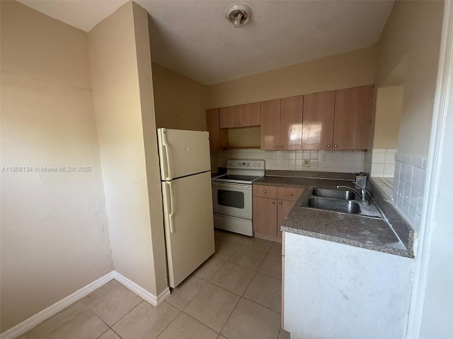 1025 NW 3rd Ave, Fort Lauderdale, FL 33311 - kitchen featuring white appliances, a sink, light brown cabinetry, light tile patterned flooring, and baseboards