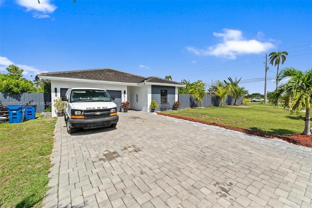 32004 SW 199th Ct, Homestead, FL 33030 - view of front of house featuring decorative driveway, an attached garage, and stucco siding