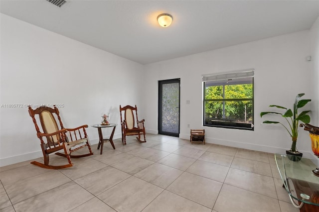 32004 SW 199th Ct, Homestead, FL 33030 - sitting room featuring light tile patterned floors and baseboards
