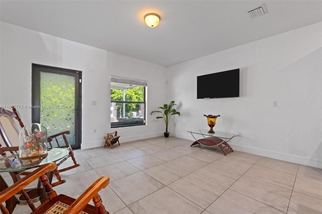 32004 SW 199th Ct, Homestead, FL 33030 - living area featuring light tile patterned floors and baseboards