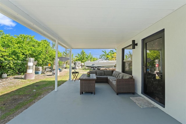 32004 SW 199th Ct, Homestead, FL 33030 - view of patio with an outdoor living space