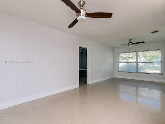 870 NE 182nd St, North Miami Beach, FL 33162 - unfurnished room with a ceiling fan and baseboards