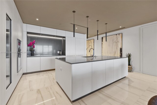 300 Biscayne Blvd Way Unit 3104, Miami, FL 33131 - kitchen with a sink, dark countertops, modern cabinets, white cabinets, and recessed lighting