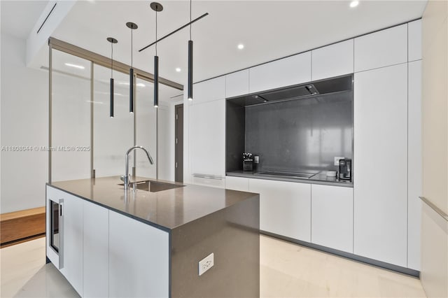300 Biscayne Blvd Way Unit 3104, Miami, FL 33131 - kitchen featuring a sink, modern cabinets, white cabinets, an island with sink, and black electric stovetop