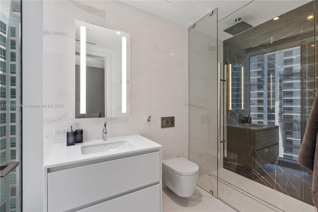 300 Biscayne Blvd Way Unit 3104, Miami, FL 33131 - bathroom featuring a shower stall, vanity, toilet, and tile walls