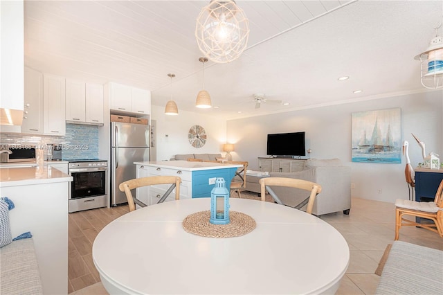 1050 SW 11th St Unit 20L, Hallandale Beach, FL 33009 - dining area featuring recessed lighting, crown molding, ceiling fan, and light tile patterned floors