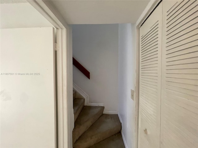 8670 NW 6th Ln Unit 4-103, Miami, FL 33126 - stairs with baseboards and carpet floors