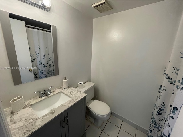 8670 NW 6th Ln Unit 4-103, Miami, FL 33126 - bathroom with vanity, toilet, and tile patterned floors