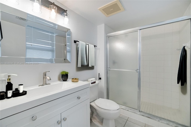 2665 SW 37th Ave Unit 906, Miami, FL 33133 - full bath featuring vanity, a stall shower, toilet, and tile patterned floors