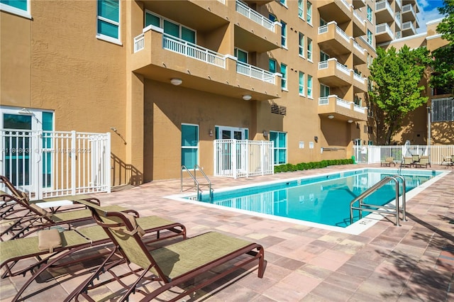 2665 SW 37th Ave Unit 906, Miami, FL 33133 - community pool with a patio
