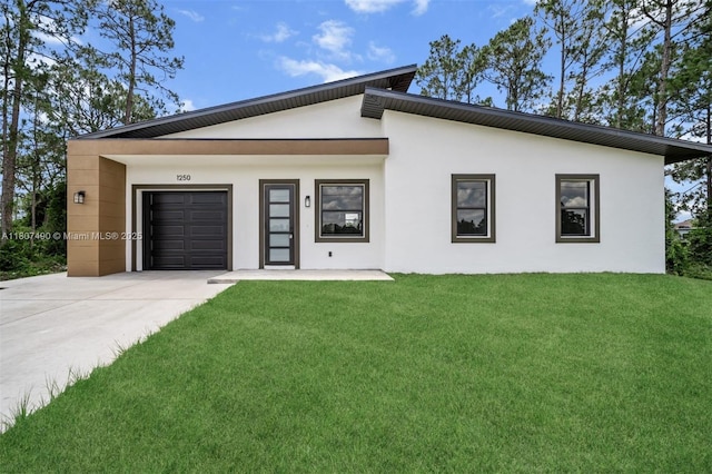 1250 Echard St E, Lehigh Acres, FL 33974 - view of front of house with driveway, a front lawn, an attached garage, and stucco siding