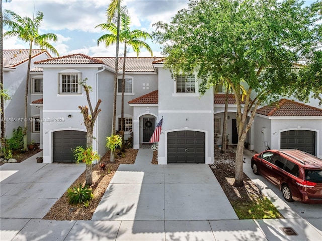 925 SW 147th Ct, Miami, FL 33194 - view of front of property featuring a tile roof, concrete driveway, stucco siding, and an attached garage