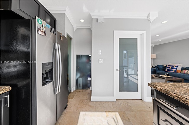 925 SW 147th Ct, Miami, FL 33194 - kitchen featuring stainless steel refrigerator with ice dispenser, ornamental molding, dark stone counters, dark cabinetry, and baseboards