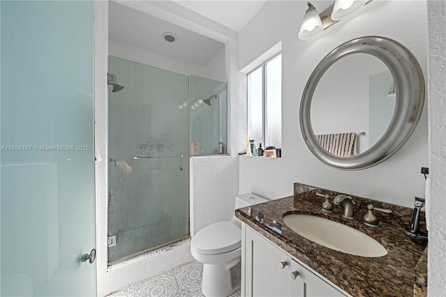 925 SW 147th Ct, Miami, FL 33194 - full bathroom with vanity, toilet, a stall shower, and tile patterned flooring