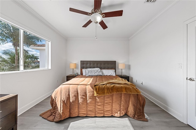 925 SW 147th Ct, Miami, FL 33194 - bedroom featuring crown molding, wood finished floors, baseboards, and a ceiling fan