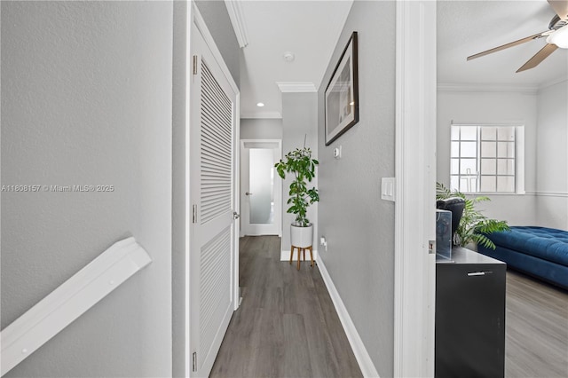 925 SW 147th Ct, Miami, FL 33194 - hallway with ornamental molding, wood finished floors, and baseboards