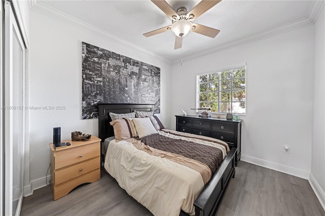 925 SW 147th Ct, Miami, FL 33194 - bedroom featuring wood finished floors, baseboards, crown molding, and a ceiling fan