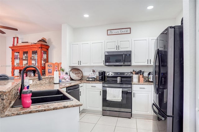 23558 SW 113th Psge, Homestead, FL 33032 - kitchen featuring appliances with stainless steel finishes, a sink, a peninsula, ceiling fan, and light tile patterned floors