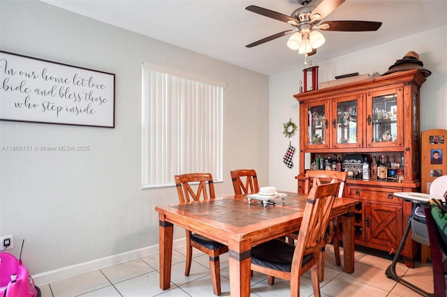 23558 SW 113th Psge, Homestead, FL 33032 - dining room with ceiling fan, light tile patterned floors, and baseboards
