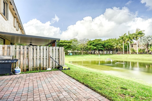 23558 SW 113th Psge, Homestead, FL 33032 - view of patio / terrace featuring a water view, grilling area, and ceiling fan