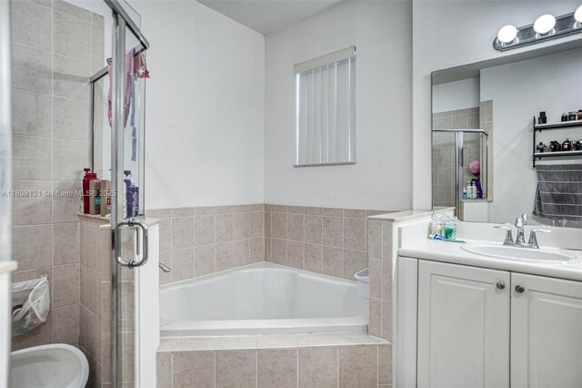 23558 SW 113th Psge, Homestead, FL 33032 - bathroom with a garden tub, vanity, and a stall shower