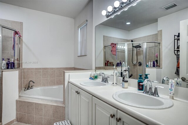 23558 SW 113th Psge, Homestead, FL 33032 - bathroom with a stall shower, a garden tub, and double vanity
