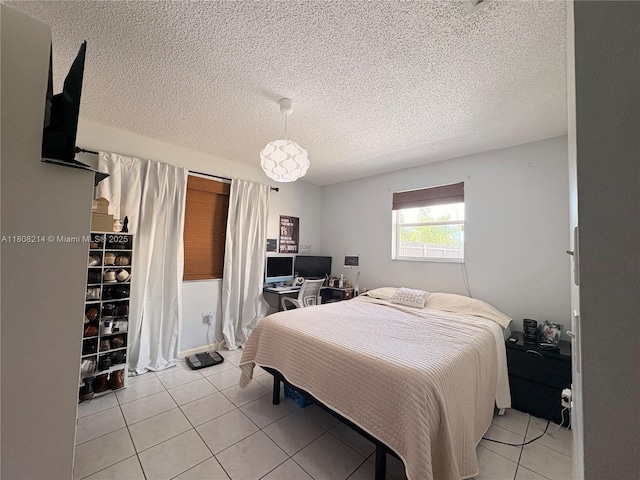 5183 Cannon Way, West Palm Beach, FL 33415 - bedroom featuring light tile patterned floors and a textured ceiling