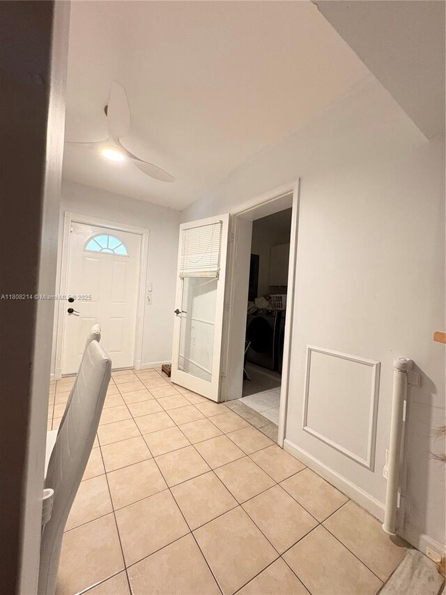 5183 Cannon Way, West Palm Beach, FL 33415 - entryway with light tile patterned floors, washer / clothes dryer, and ceiling fan