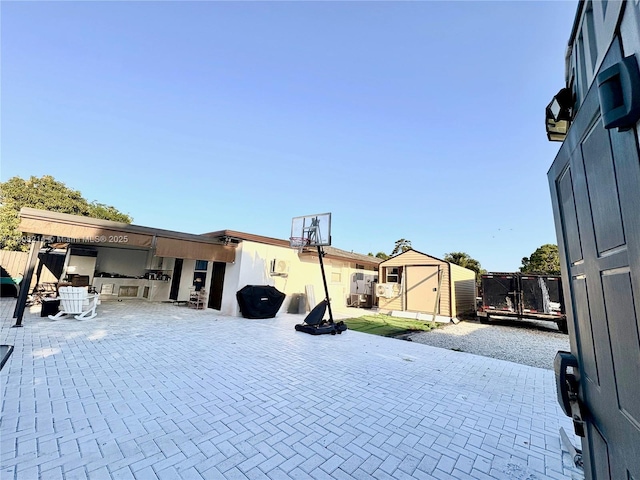 5183 Cannon Way, West Palm Beach, FL 33415 - view of front of house with a patio and an outdoor kitchen