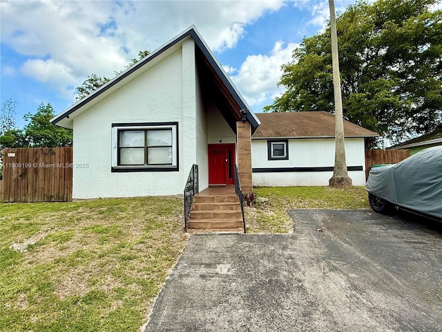 13550 SW 286th St, Homestead, FL 33033 - mid-century modern home featuring stucco siding