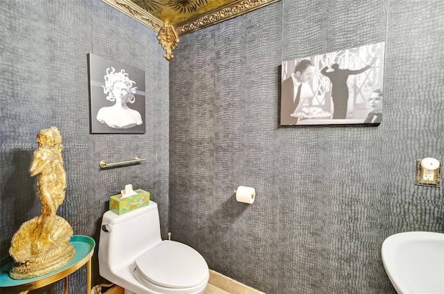 41 SE 5th St Unit 1012, Miami, FL 33131 - half bathroom with toilet and a sink