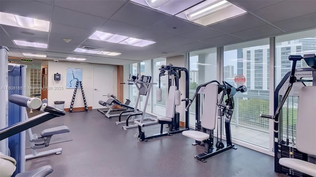 41 SE 5th St Unit 1012, Miami, FL 33131 - exercise room with a drop ceiling and floor to ceiling windows