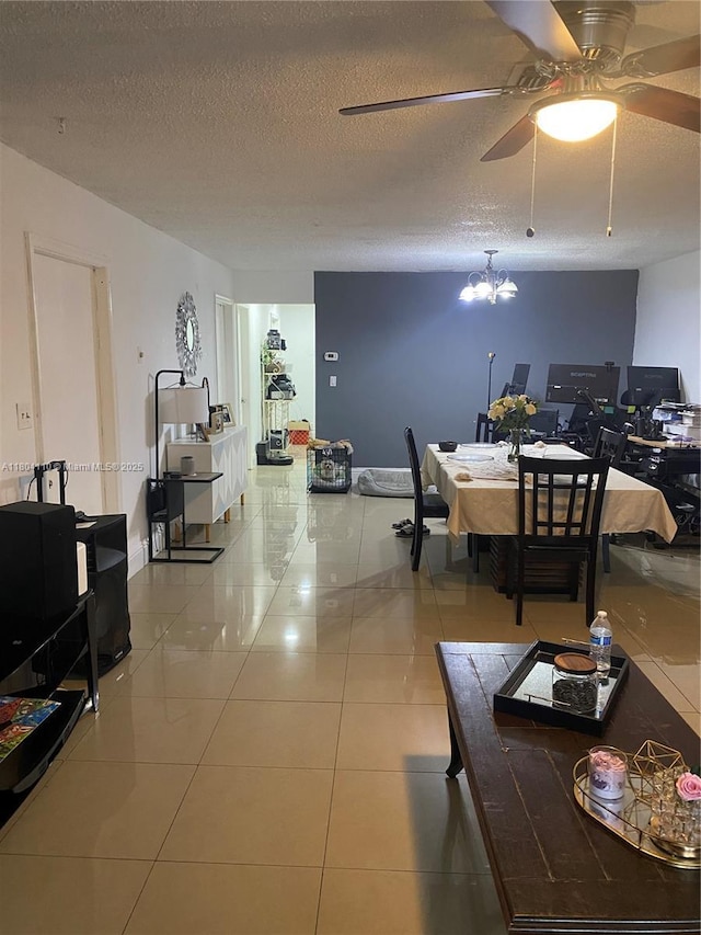 450 NW 46th St Unit 450, Deerfield Beach, FL 33064 - tiled living room with ceiling fan, an office area, a textured ceiling, and a chandelier