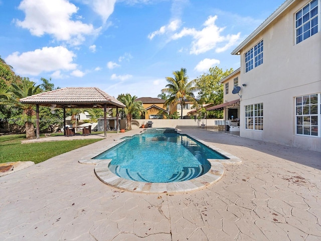 11230 SW 156th Ave, Miami, FL 33196 - view of swimming pool featuring a gazebo, a patio area, a fenced backyard, and a pool with connected hot tub