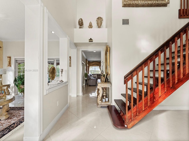11230 SW 156th Ave, Miami, FL 33196 - tiled entryway featuring stairs, baseboards, and ornamental molding