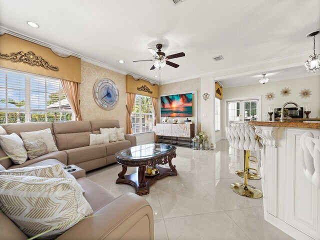 11230 SW 156th Ave, Miami, FL 33196 - living room featuring ornamental molding, ceiling fan, wallpapered walls, light tile patterned floors, and recessed lighting