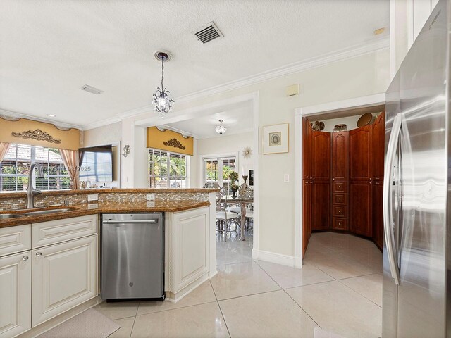 11230 SW 156th Ave, Miami, FL 33196 - kitchen featuring stainless steel appliances, a sink, crown molding, light tile patterned flooring, and decorative light fixtures