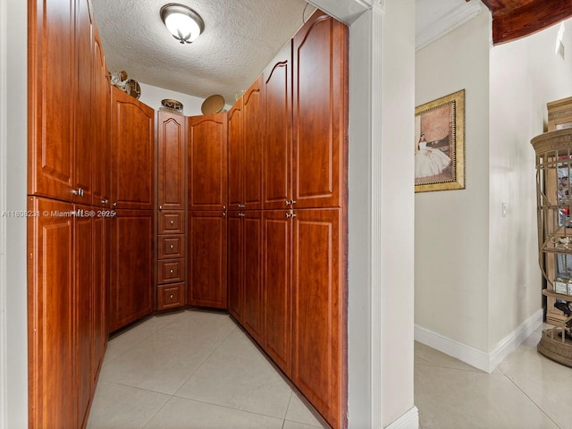 11230 SW 156th Ave, Miami, FL 33196 - hallway featuring light tile patterned floors, baseboards, and a textured ceiling