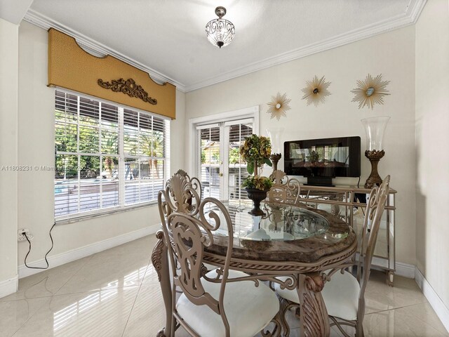 11230 SW 156th Ave, Miami, FL 33196 - dining area featuring crown molding, baseboards, and light tile patterned flooring