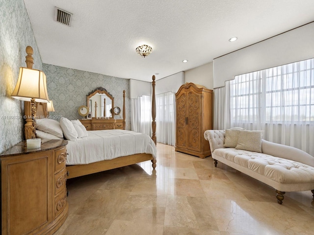 11230 SW 156th Ave, Miami, FL 33196 - bedroom with wallpapered walls and a textured ceiling