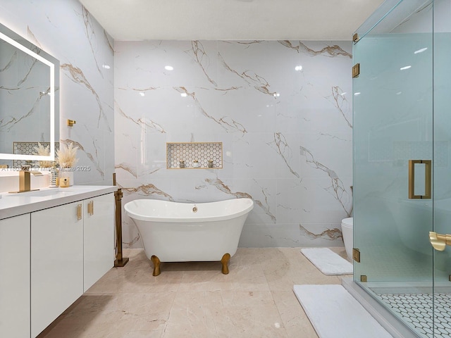 11230 SW 156th Ave, Miami, FL 33196 - full bath with vanity, stone wall, marble tiled flooring, a stall shower, and a freestanding tub