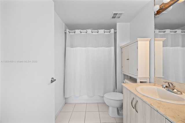 1401 SW 22nd St Unit 701, Miami, FL 33145 - full bath with vanity, tile patterned flooring, toilet, and shower / bath combo