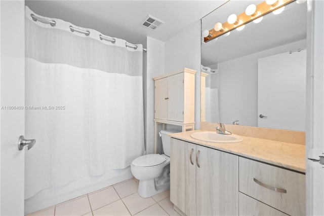 1401 SW 22nd St Unit 701, Miami, FL 33145 - full bath featuring tile patterned floors, vanity, toilet, and shower / tub combo with curtain