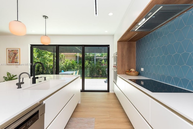 8959 Abbott Ave, Surfside, FL 33154 - kitchen featuring dishwasher, custom exhaust hood, white cabinetry, light countertops, and black electric cooktop