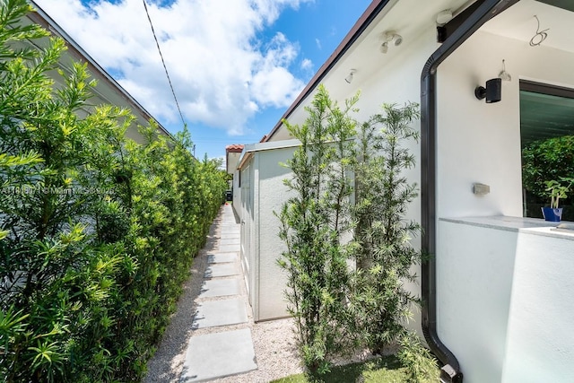 8959 Abbott Ave, Surfside, FL 33154 - view of side of property with stucco siding